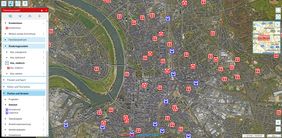 Gesamtansicht von "Düsseldorf Maps" mit Auszug des Datenangebotes: Kitas, Krankenhäuser, Bahnhöfe unterlegt mit dem Luftbild