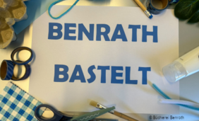 Foto von Bastelmaterialien und -werkzeugen und einem Schild mit der Aufschrift "Benrath Bastelt"