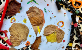 Foto von gebastelten Figürchen aus Herbstblättern
