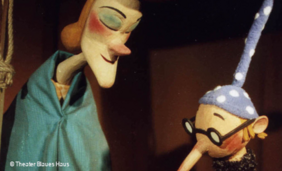 Foto von zwei hölzernen Marionettenpuppen