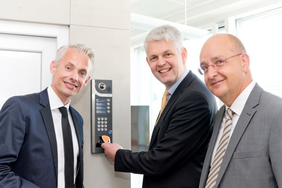 From left: René Radermacher, Director of the German branch of INTRATONE, State Secretary Christoph Dammermann, Roger Leclerg, Founder and CEO of INTRATONE