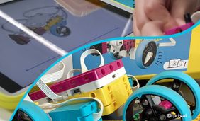 Fotocollage mit einem TabletPC und einer gebauten LegoSpike Figur